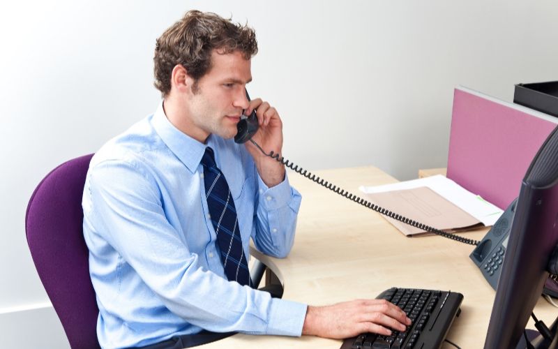 voip-service-providers-man-working-min